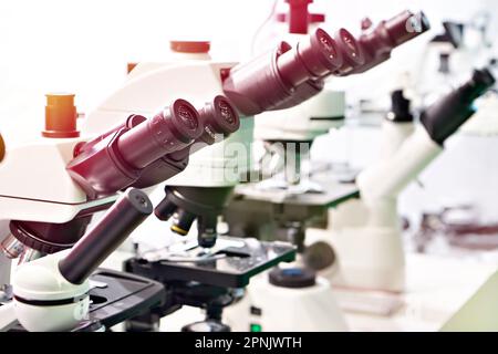 Optical microscopes in the store at the exhibition Stock Photo