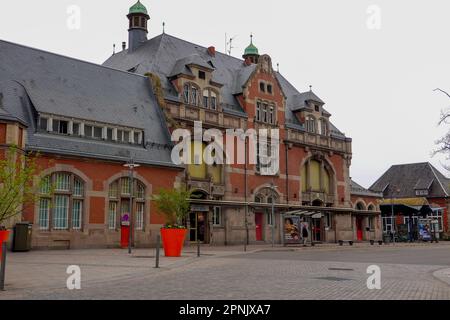 Man outside the Colmar train station in the Alsace part of France. Stock Photo