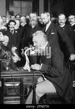 Alexander Graham Bell telephone. Photograph of the Scottish born inventor of the first practical telephone, Alexander Graham Bell (1847-1922), at the opening of the New York and Chicago telephone line in October 1892. Photograph by E J Holmes. Stock Photo