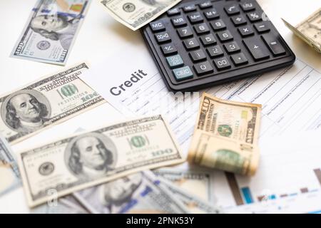 business graph chart paper pen calculator us dollar on office desk. Checking financial reports. Stock Photo