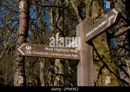 Fingerpost sign for the West Highland Way and the Tyndrum Cycle Path to Crianlarich, Tyndrum, Scotland Stock Photo