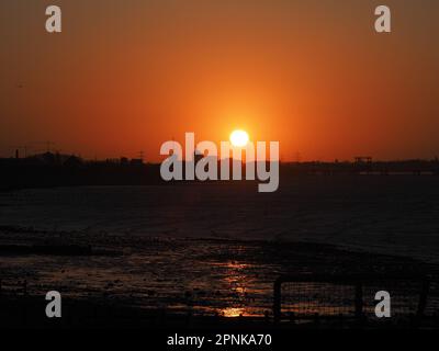 Sheerness, Kent, UK. 19th Apr, 2023. UK Weather: stunning sunset on a cold and windy evening in Sheerness, Kent. Credit: James Bell/Alamy Live News Stock Photo