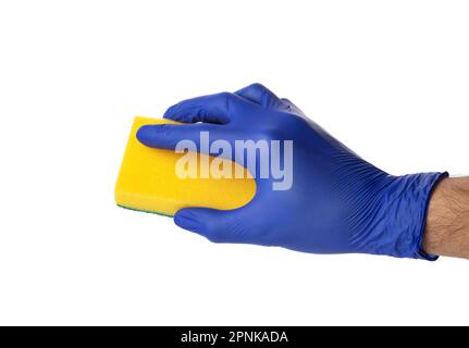 Sponge for washing and cleaning in male hand. Hand in a latex glove isolated on white. A hand in a glove holds a sponge for washing and cleaning. Stock Photo