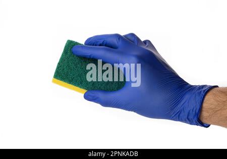 Sponge for washing and cleaning in male hand. Hand in a latex glove isolated on white. A hand in a glove holds a sponge for washing and cleaning. Stock Photo