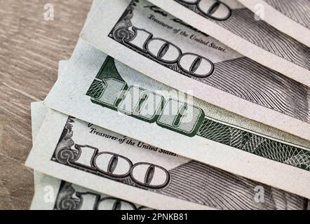 Extreme close-up of one hundred bill. Macro. American paper money. Focus on a $100 bill . US banknotes close-up. Business economy and the USA dollar. Stock Photo