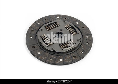 New clutch disc isolated on white background. Auto parts. Spare parts for car. Stock Photo