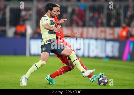 Munich, Germany. 19th Apr, 2023. MUNICH, GERMANY - APRIL 19: Ilkay Gundogan of Manchester City battles for the ball with Eric Maxim Choupo-Moting of FC Bayern Munchen during the UEFA Champions League Quarterfinal Second Leg match between FC Bayern Munchen and Manchester City at the Allianz Arena on April 19, 2023 in Munich, Germany (Photo by Rene Nijhuis/Orange Pictures) Credit: Orange Pics BV/Alamy Live News Stock Photo