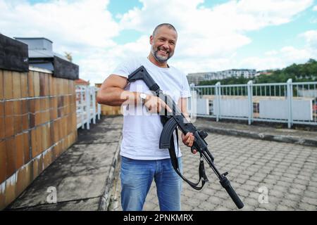 Rifleman with a gun in hands Stock Photo