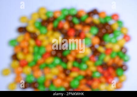 Defocused Colorful Candys on a White Background Stock Photo