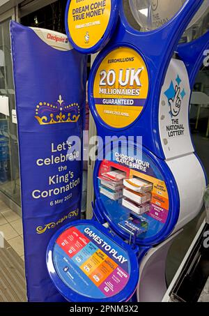 National Lottery 20 UK millionaires guaranteed - Lets celebrate the kings coronation, 6th May 2023, signs in a Tesco store, Lincoln city centre Stock Photo