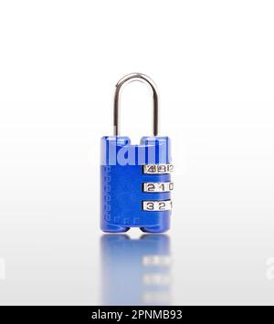 Blue combination padlock isolated on a white background with reflection included clipping path. Stock Photo