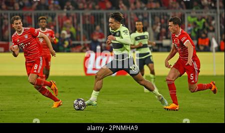 Munich, Germany. 19th Apr, 2023. Jack Grealish (C) of Manchester City breaks through during the UEFA Champions League quarterfinal second leg match between Bayern Munich and Manchester City in Munich, Germany, on April 19, 2023. Credit: Philippe Ruiz/Xinhua/Alamy Live News Stock Photo