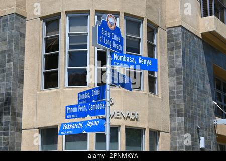 LONG BEACH, CALIFORNIA - 19 APR 2023: Street sign with the Sister Cities of Long Beach on the Promenade.. Stock Photo