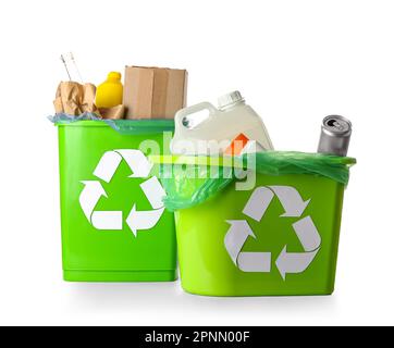 Trash bins with different garbage and recycling symbol isolated on white background Stock Photo