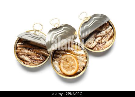 Opened tin cans with sprats in oil isolated on white background Stock Photo