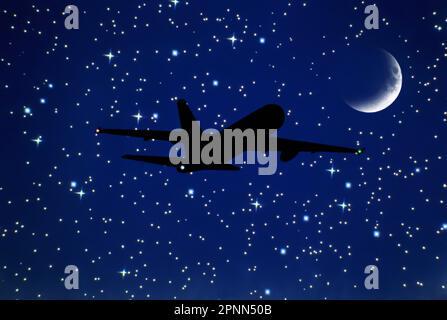 SILHOUETTE OF AIRBORNE BOEING 767 COMMERCIAL PASSENGER AIRCRAFT IN STARRY NIGHT SKY Stock Photo