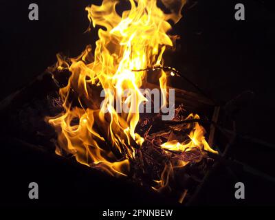 Close-up image of fire on black background. Stock Photo