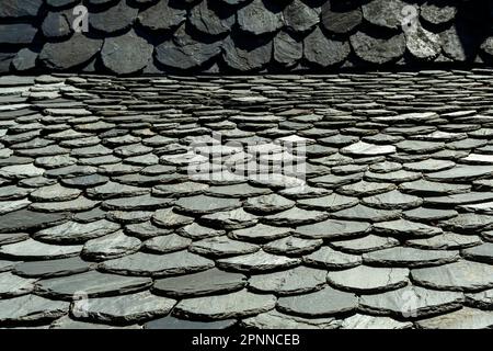 Traditional slate roof (lauze stone) in Auvergne, France Stock Photo