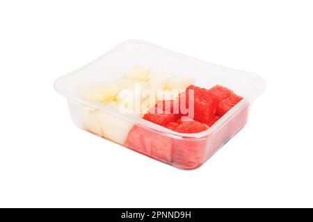 Fruit salad with watermelon and melon in a plastic container on a white background. High quality photo Stock Photo