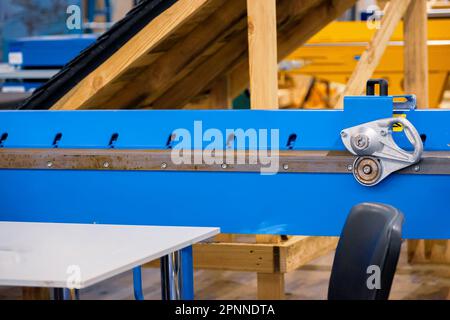 Manual bending machine with roller knife. Stock Photo