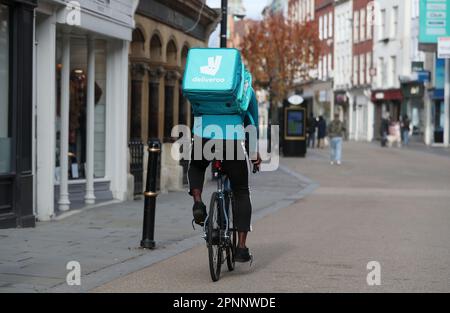 File photo dated 05/11/20 of a Deliveroo rider. Takeaway delivery firm Deliveroo has reported a further slowdown in orders as demand wanes following the pandemic and amid the cost-of-living crisis. The London-listed group said UK and Ireland order numbers fell 3% in the first three months of the year, although food price inflation boosted gross transaction value (GTV), which lifted 6%. Issue date: Thursday April 20, 2023. Stock Photo