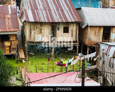 Iquitos, Peru - Apr, 2022:  Floating shantytown of Belén, consisting of scores of huts, built on rafts, which rise and fall with the river. Latin Amer Stock Photo