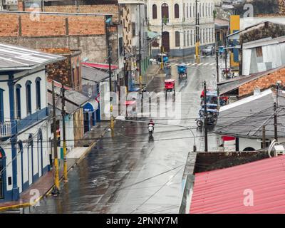 Iquitos, Peru - Sep, 2019: Street of small tropical town on bank of the Amazon river. Amazonia. South America. Stock Photo