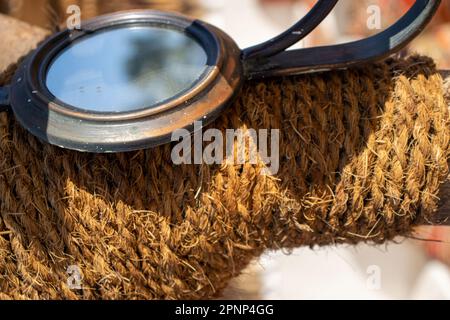 orange rope wound round wood texture Stock Photo - Alamy