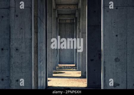 Abstract minimal geometric architecture pattern. Abandoned construction concrete building perspective. Industrial background Stock Photo