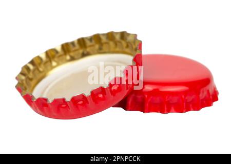 Used crumpled metal beer cap on white background Stock Photo