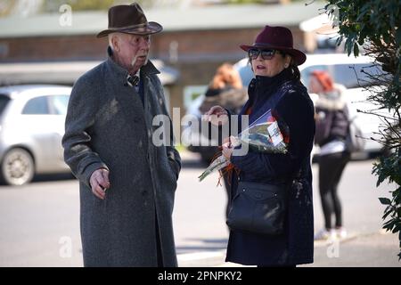 Wellwishers arrive at the Walnut Tree Pub in Aldington, Kent, as they wait for Paul O'Grady's funeral cortege to travel through the village of Aldington, Kent, ahead of his funeral at St Rumwold's Church. Picture date: Thursday April 20, 2023. Stock Photo