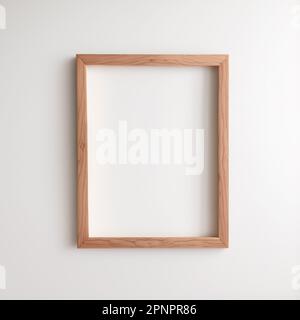 Old wooden picture frame with vertical shape hanging on a white wall mockup for pictures and posters Stock Photo