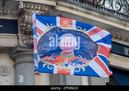 London, UK.  20 April 2023.  Coronation related souvenirs for sale near Trafalgar Square ahead of the coronation of King Charles III on 6 May.  Credit: Stephen Chung / Alamy Live News Stock Photo