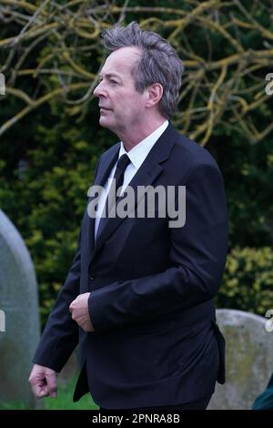 Comedian Julian Clary arriving for the funeral of Paul O'Grady at St Rumwold's Church in Aldington, Kent. Picture date: Thursday April 20, 2023. Stock Photo