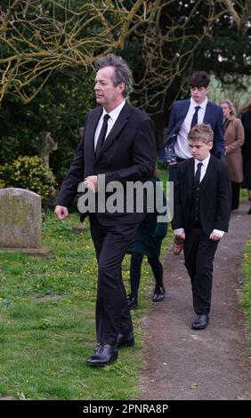 Comedian Julian Clary arriving for the funeral of Paul O'Grady at St Rumwold's Church in Aldington, Kent. Picture date: Thursday April 20, 2023. Stock Photo