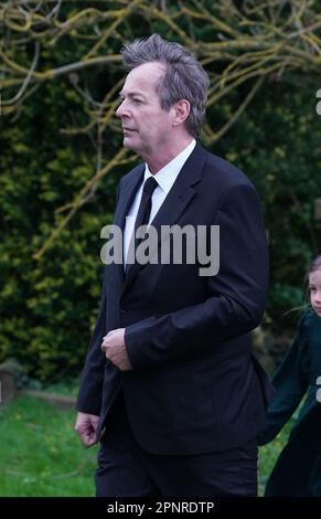 Comedian Julian Clary arriving for the funeral of Paul O'Grady at St Rumwold's Church in Aldington, Kent. Picture date: Thursday April 20, 2023. Stock Photo