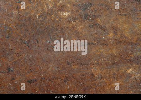Grunge rusty metal background or texture with scratches and cracks, close up, top view Stock Photo