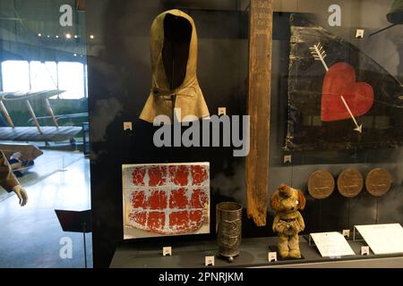 Flying helmet and fabric fragment from the wreck of Manfred von Richtofen’s red Fokker Dr.1 Triplane (aka The Red Baron) Stock Photo