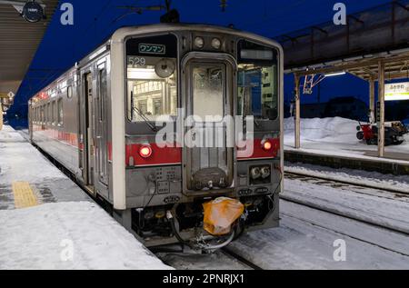 A JR Hokkaido KiHa 54 series train on a winter morning at Fukagawa Station in Japan. Stock Photo