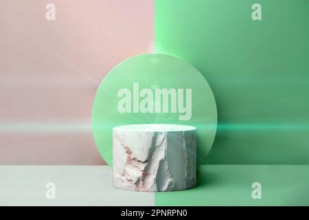 white round marble podium on mint color background. Scene to show cosmetic podructs. Showcase, display case. Stock Photo