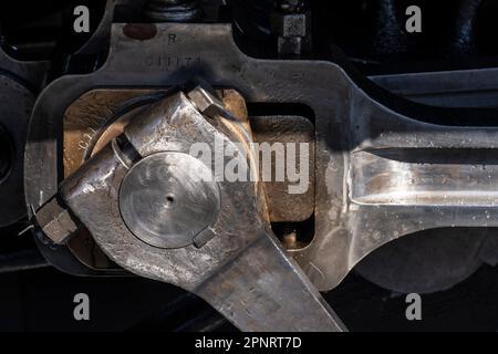 Running gear of a JR Hokkaido steam engine at Kushiro Station in Japan. Stock Photo