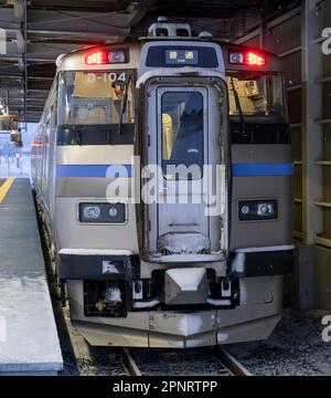 A JR Hokkaido KiHa 201 series train at Kutchan Station in Japan. Stock Photo