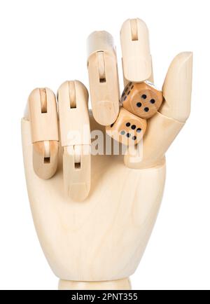 Dices gambling futuristic metaphor in wooden robotic hand. Wooden dices. Stock Photo