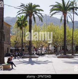 Palm fringed square in the village of Esporles in the Tramuntana Mountains of Majorca Spain Stock Photo