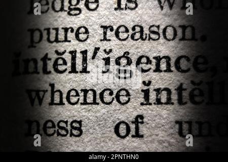 Definition of word intelligence on dictionary page, close-up Stock Photo