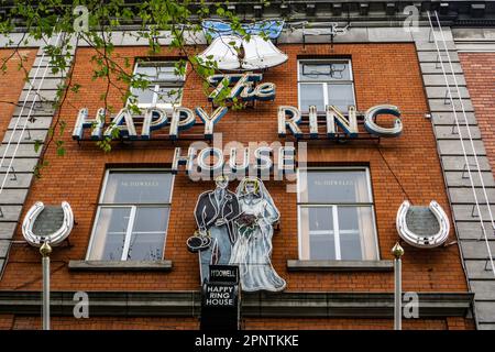 The Happy Ring House sign over McDowell’s Jewellers in O’Connell Street, Dublin, Ireland. The sign was first erected in 1952 and restored in 2021 Stock Photo