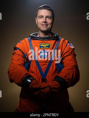 Houston, United States. 28 March, 2023. NASA Astronaut Reid Wiseman and Artemis II commander poses in the bright orange Orion Crew Survival System suit at the Johnson Space Center, March 28, 2023 in Houston, Texas.  Credit: Robert Markowitz/NASA/Alamy Live News Stock Photo