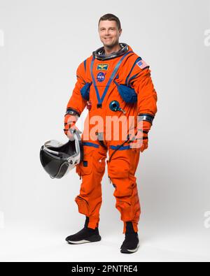 Houston, United States. 30 March, 2023. NASA Astronaut Reid Wiseman and Artemis II commander poses in the bright orange Orion Crew Survival System suit at the Johnson Space Center, March 28, 2023 in Houston, Texas.  Credit: Robert Markowitz/NASA/Alamy Live News Stock Photo