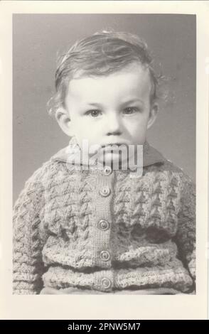 BRNO, THE CZECHOSLOVAK REPUBLIC, CIRCA 1972: A small boy retro photo. Portrait photo was taken in photo studio, circa 1972. Stock Photo