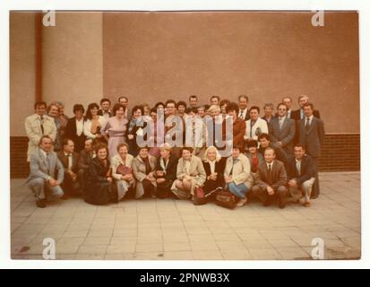THE CZECHOSLOVAK SOCIALIST REPUBLIC - OCTOBER, 1985: Vintage photo shows group of people - former classmates and their meeting after years. Stock Photo